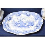 Large mid-19th century platter with a flow blue design, the reverse with Italian flower garden in