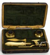 Small box containing brass measuring instruments