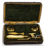 Small box containing brass measuring instruments