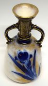 Doulton Burslem vase, late 19th century, the gilt ground with a blue floral design with loop