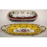 19th century English porcelain pen tray, the yellow ground with a panel of floral sprays supported