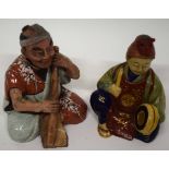 Two porcelain nodding figures of Orientals