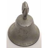 Metal Victory bell modelled in relief with Churchill with inscription "Made for RAF Benevolent Fund"