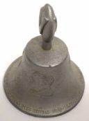 Metal Victory bell modelled in relief with Churchill with inscription "Made for RAF Benevolent Fund"