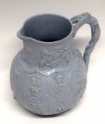 19th century Cobridge ware jug decorated in relief with Royal insignia