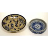 Small Chinese porcelain circular dish and further interesting Oriental pottery dish with a blue