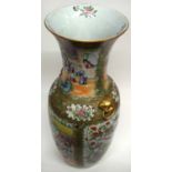 Large Cantonese porcelain floor vase decorated in famille rose with panels of Chinese figures and