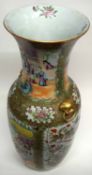 Large Cantonese porcelain floor vase decorated in famille rose with panels of Chinese figures and