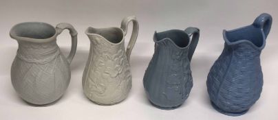 Group of four mid-19th century pottery jugs all with moulded designs (4), tallest 22cm