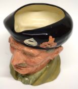 Royal Doulton character jug of Monty, 16cm high