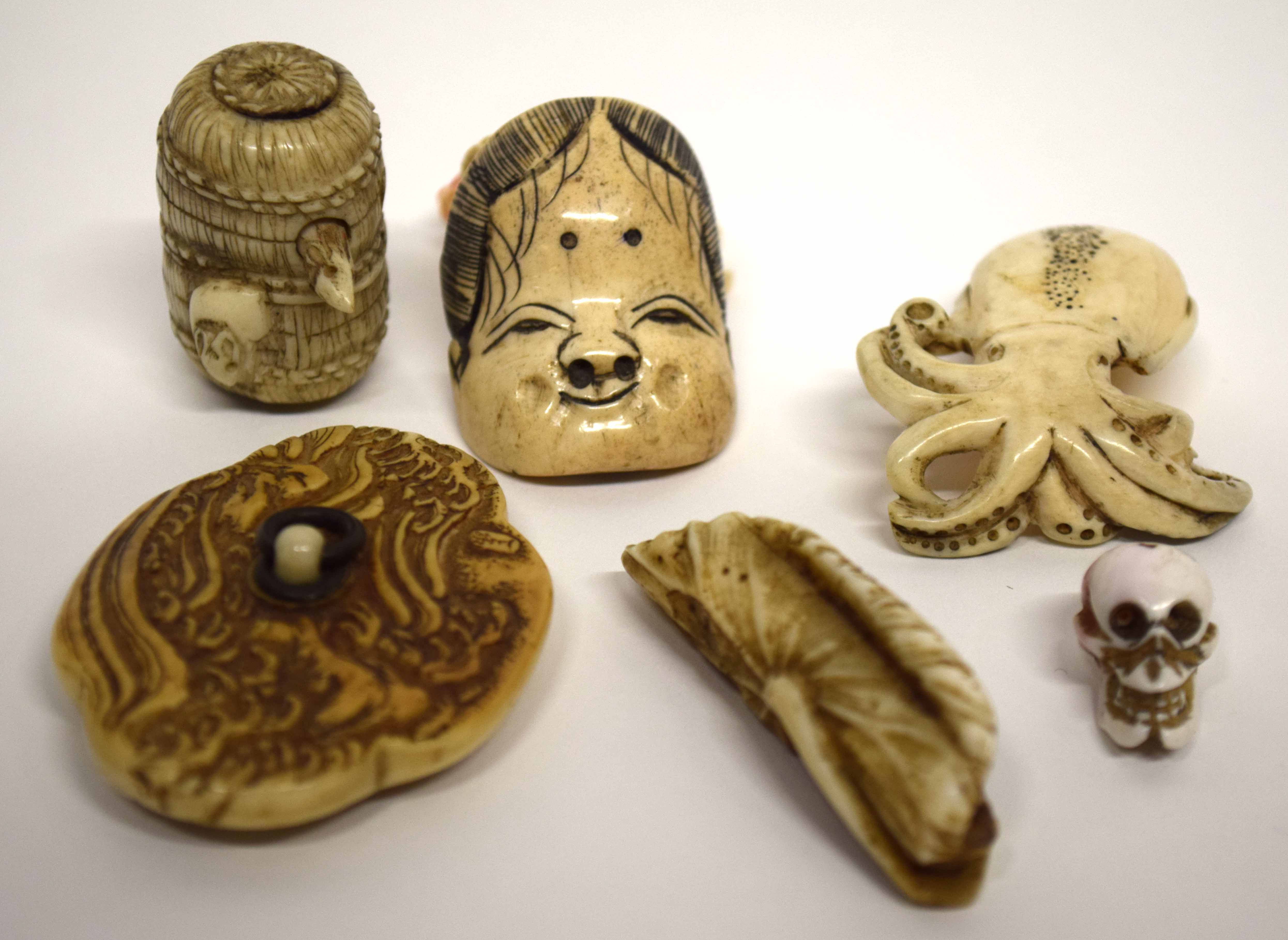 Group of netsuke and ivory carvings (qty)