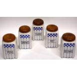 Group of five kitchen containers with wooden tops and blue and white chequered design to front,