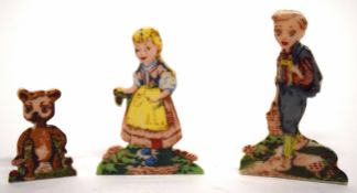 Group of three Wade Snippet figures one entitled "Gingy", another "Hansel" No 4 and "Gretel" No 5 (