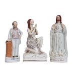 Group of three Staffordshire religious figures including Moody, a further Staffordshire figure of
