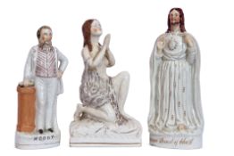 Group of three Staffordshire religious figures including Moody, a further Staffordshire figure of