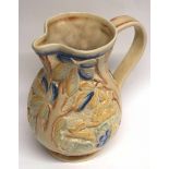 Mid-20th century Beswick ware jug shape 676, decorated in relief with rabbits in a floral setting