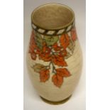 Crown Ducal ribbed vase decorated with a tube lined design of autumn leaves, by Charlotte Rhead,