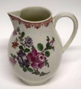 Large Lowestoft porcelain milk jug with a polychrome design of flowers, 12cm high