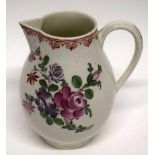 Large Lowestoft porcelain milk jug with a polychrome design of flowers, 12cm high