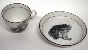 Early 19th century cup and saucer, black printed with and Adam Buck style print, the saucer 13cm