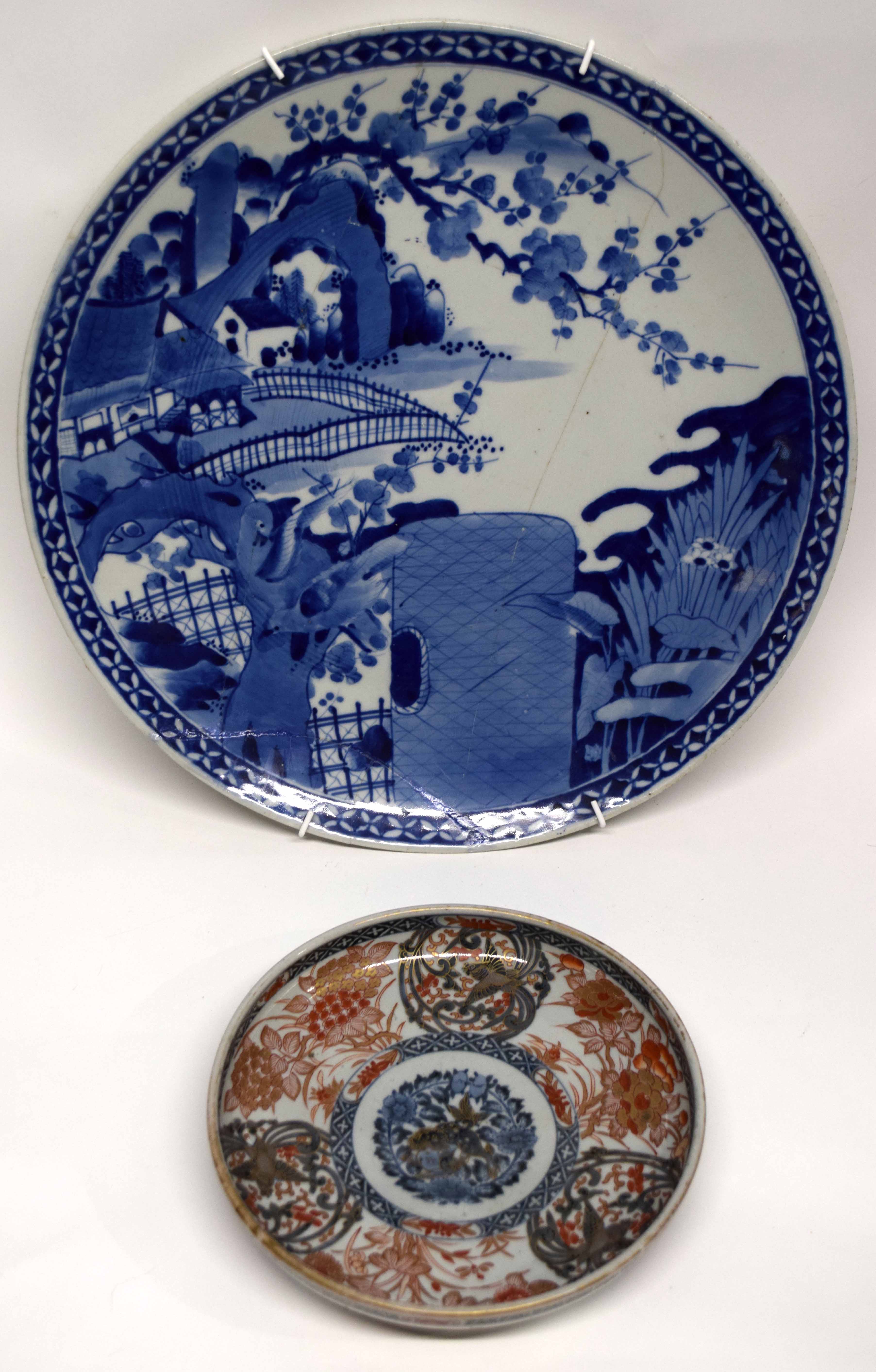 Large Japanese porcelain blue and white plate or charger (a/f), together with a smaller Japanese