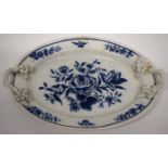 Lowestoft porcelain butter tub stand with twig handles, the stand with a blue printed design with