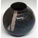 Raku ovoid vase by Christa Maria Herrmann (potting 1987-1997) decorated with a streaked design on