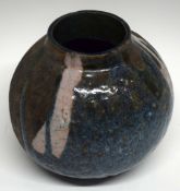 Raku ovoid vase by Christa Maria Herrmann (potting 1987-1997) decorated with a streaked design on
