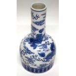 Chinese porcelain vase of mallet shape, decorated in underglaze blue with a dragon chasing the