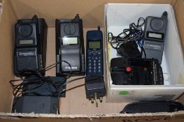 BOX CONTAINING MOTOROLA PHONE EQUIPMENT