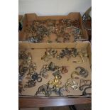 TWO BOXES OF VARIOUS BRASS COAT HOOKS AND HANGERS ETC