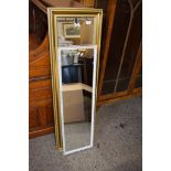 THREE QUARTER LENGTH GILT FRAMED WALL MIRROR, HEIGHT APPROX 136CM TOGETHER WITH A SLIGHTLY SMALLER