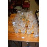 QUANTITY OF GLASS WARES INCLUDING WINE GLASSES AND TUMBLERS