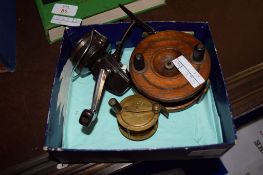 BOX CONTAINING THREE FISHING REELS, ONE WOODEN AND TWO METAL