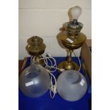 TWO BRASS OIL LAMPS WITH SHADES AND GLASS FUNNELS