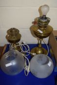 TWO BRASS OIL LAMPS WITH SHADES AND GLASS FUNNELS