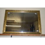 LARGE MIRROR WITH SCROLLING GILT FRAME