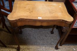 WALNUT FOLDING CARD TABLE, RAISED ON BALL AND CLAW FEET, WITH CROSS BANDED DECORATION, WIDTH