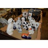 GROUP OF STAFFORDSHIRE DOGS AND POODLES, PLUS A GREYHOUND PEN HOLDER