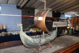 Early 20th century patinated brass model of a viking ship^ 41cm long