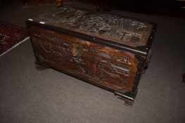 Early 20th century camphor wood Oriental coffer^ typically moulded decoration throughout and