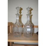 PAIR OF CUT GLASS DECANTERS, BOTH ENGRAVED WITH LEAF DECORATION