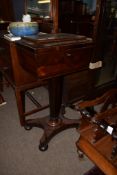 Early 19th century rosewood tepoy^ the sarcophagus moulded rectangular top enclosing fitted interior