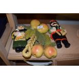 TWO DUTCH STYLE WOODEN DOLLS AND TWO PIECES OF WOODEN FRUIT