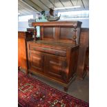 18th century and later oak sideboard^ plain pediment supported by tulip baluster columns over a