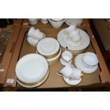 WHITE GLAZED DINNER WARES COMPRISING PLATES, SIDE PLATES AND BOWLS