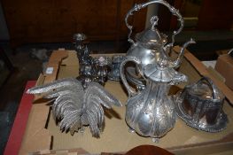 QUANTITY OF PLATED WARES INCLUDING KETTLE AND STAND, TWO TAPER STICKS AND A CANDLESTICK
