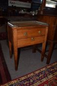 Mahogany bedside cabinet^ gilt metal gallery surround over a frieze drawer and fall front