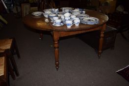 Large oak drop leaf dining table raised on ring turned supports with casters^ 157cm wide