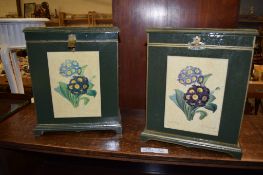 PAIR OF FLORAL DECORATED AND GREEN PAINTED SMALL CABINETS WITH LIFTING TOPS, 26CM WIDE